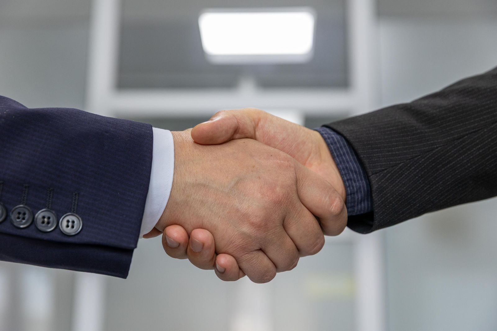 Business handshake representing a long-term agreement